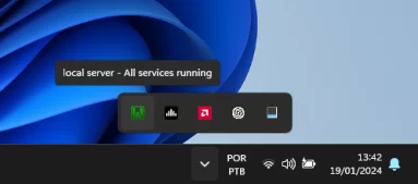 Captura de tela do ícone do WampServer na área de notificação no Windows 11 indicando que todos os serviços estão rodando. A indicação é tanto textual 